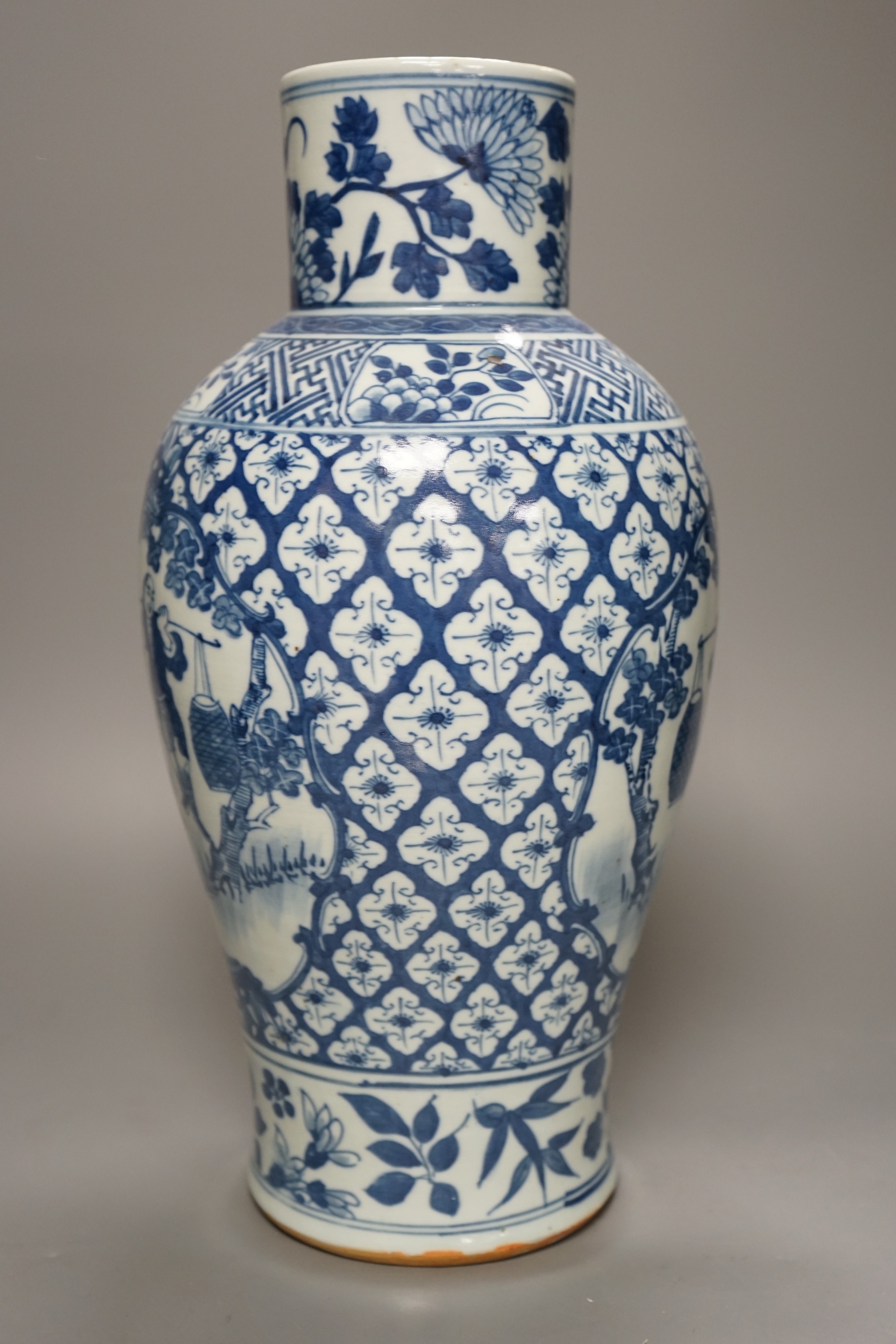 A 19th century Chinese blue and white 'Tradesmen' vase, 40cm